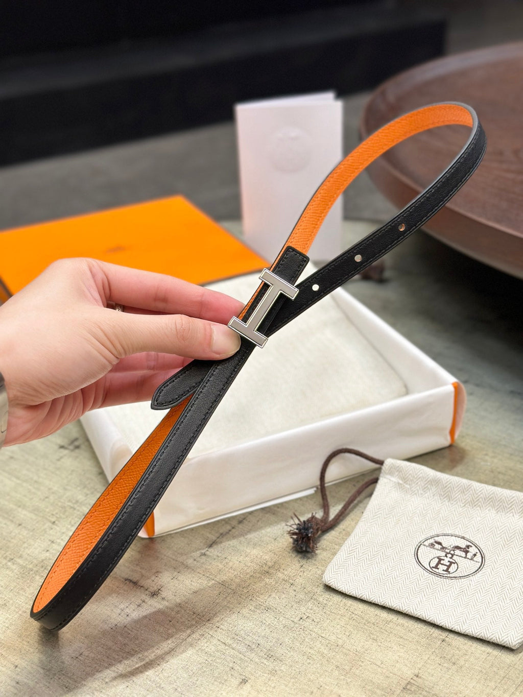HERMES FOCUS BUCKLE & REVERSIBLE ORANGE AND BLACK LEATHER STRAP 13MM SILVER HARDWARE