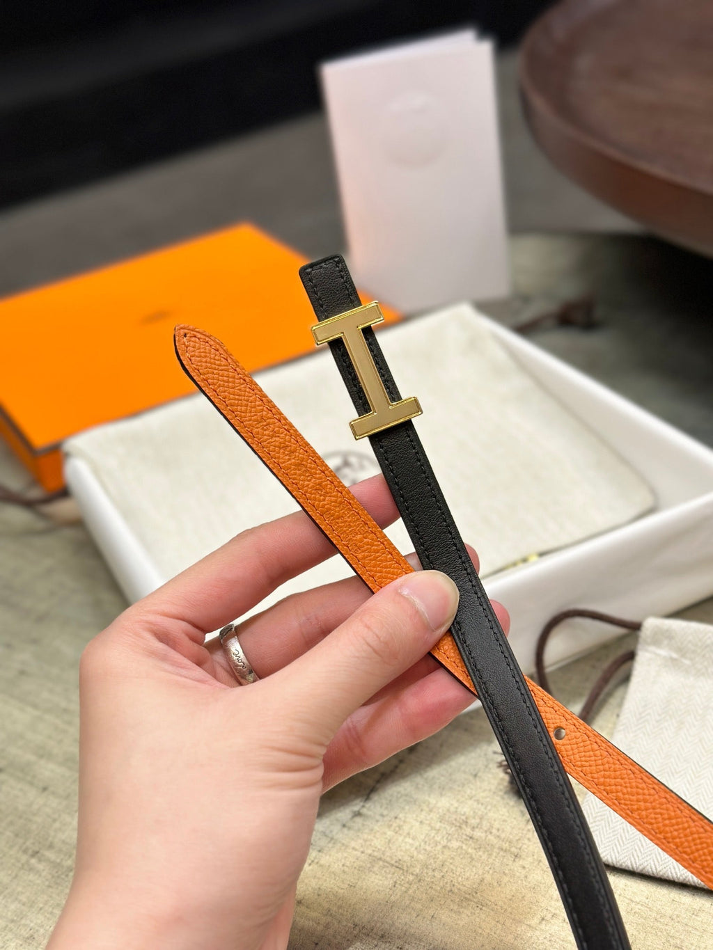 HERMES FOCUS BUCKLE & REVERSIBLE BLACK AND ORANGE LEATHER STRAP 13MM GOLD HARDWARE