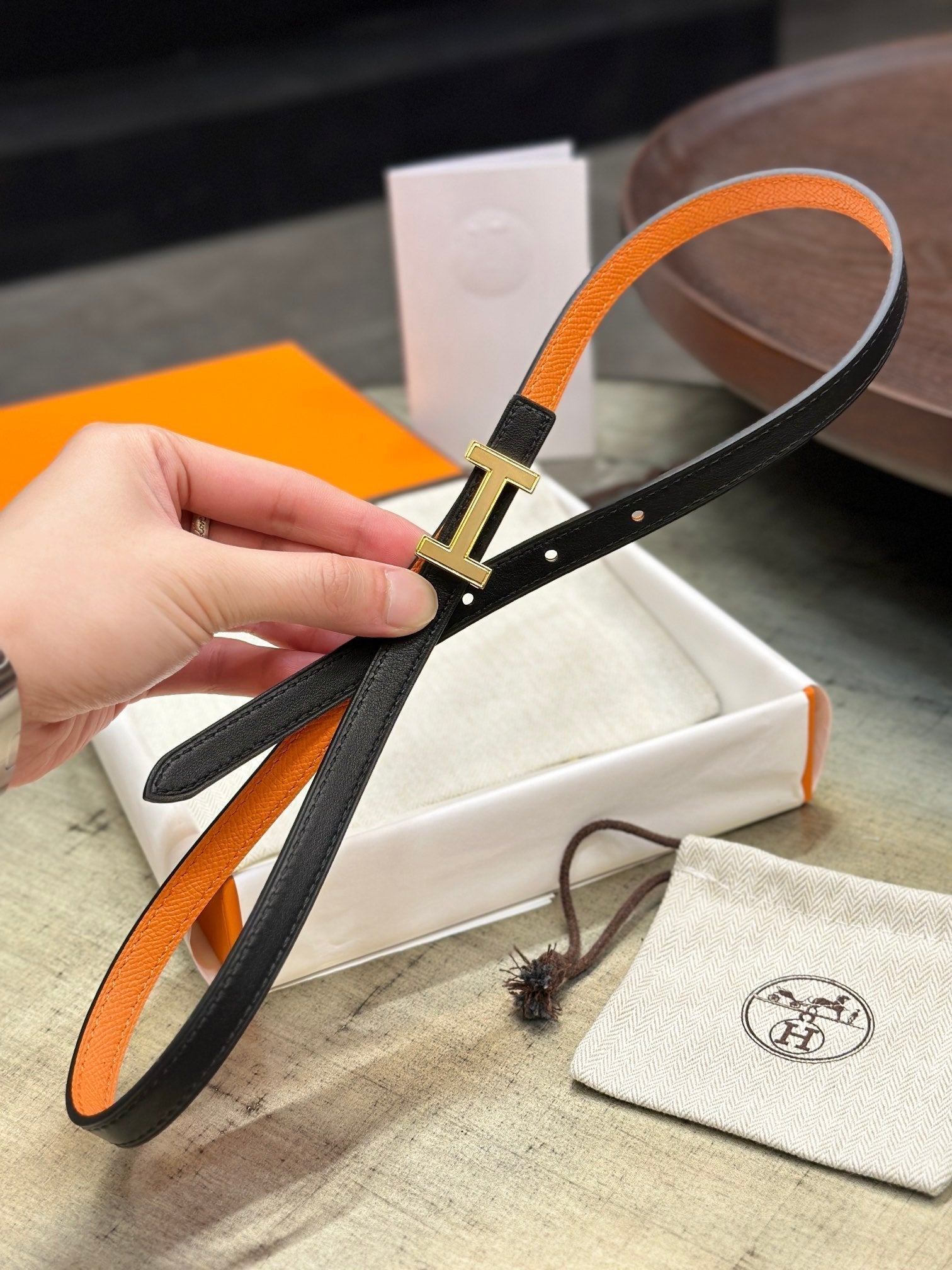 HERMES FOCUS BUCKLE & REVERSIBLE BLACK AND ORANGE LEATHER STRAP 13MM GOLD HARDWARE