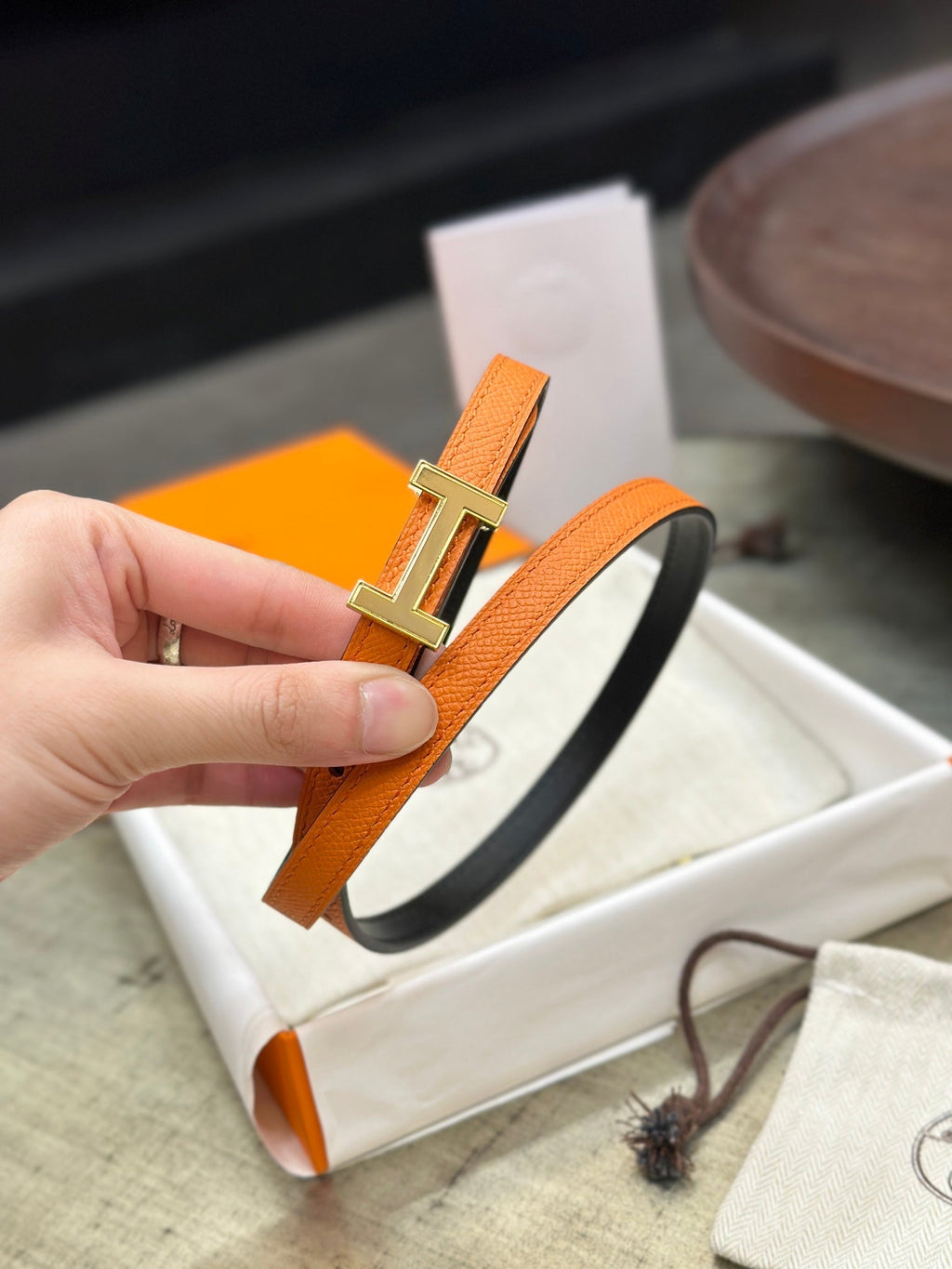 HERMES FOCUS BUCKLE & REVERSIBLE BLACK AND ORANGE LEATHER STRAP 13MM GOLD HARDWARE