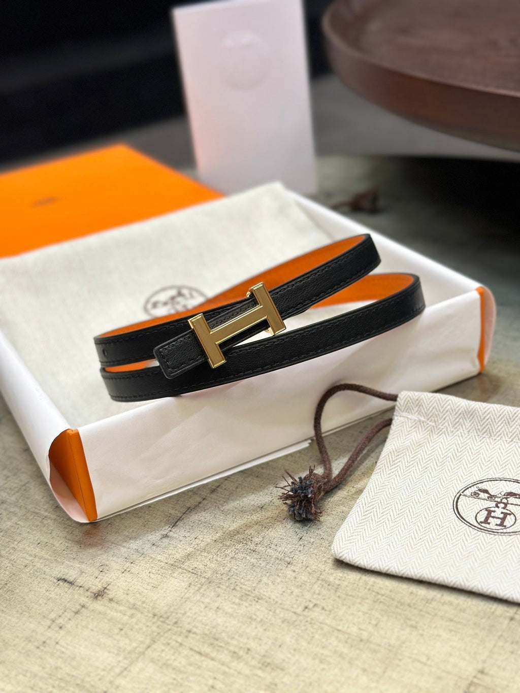 HERMES FOCUS BUCKLE & REVERSIBLE BLACK AND ORANGE LEATHER STRAP 13MM GOLD HARDWARE