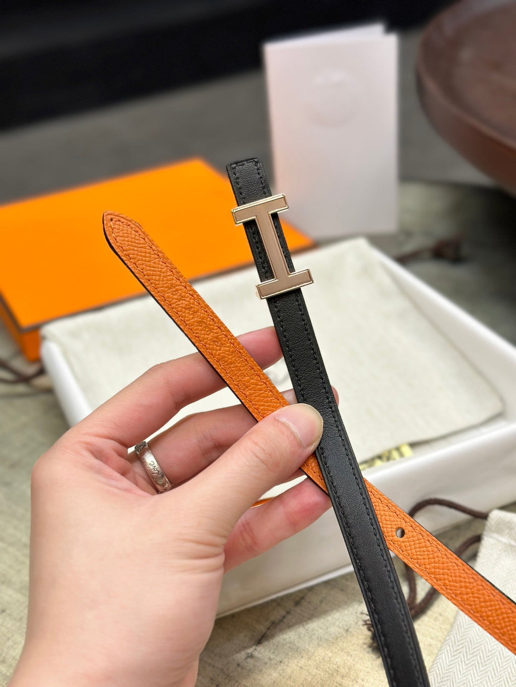 HERMES FOCUS BUCKLE & REVERSIBLE BLACK AND ORANGE LEATHER STRAP 13MM COPPER HARDWARE
