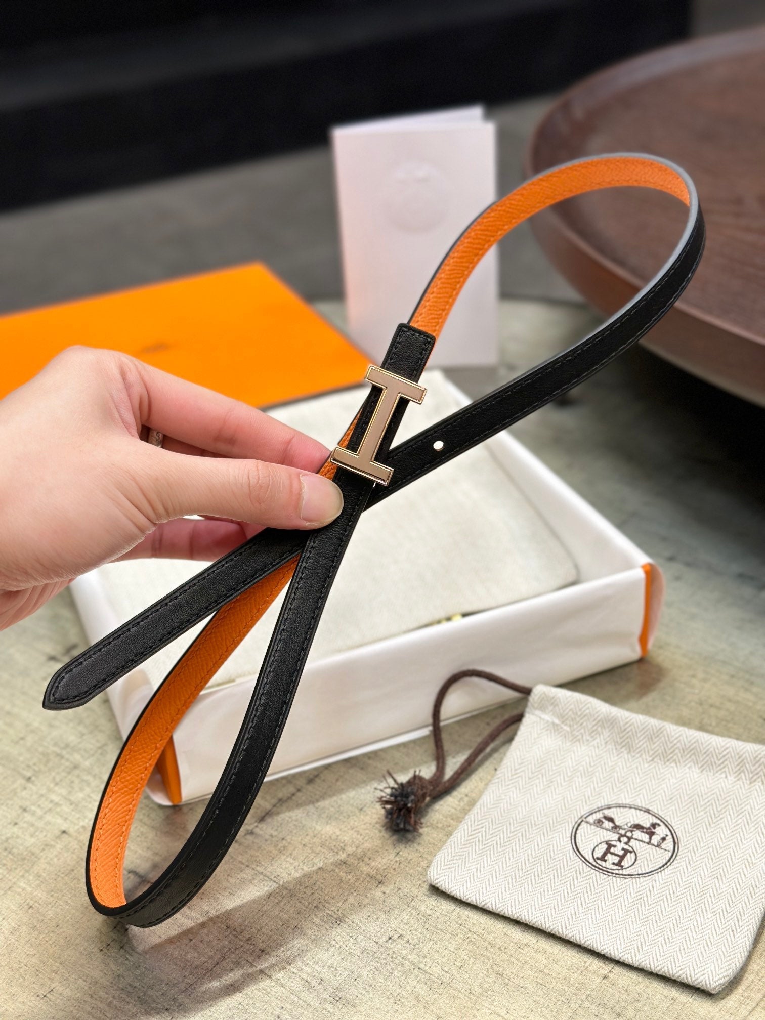 HERMES FOCUS BUCKLE & REVERSIBLE BLACK AND ORANGE LEATHER STRAP 13MM COPPER HARDWARE