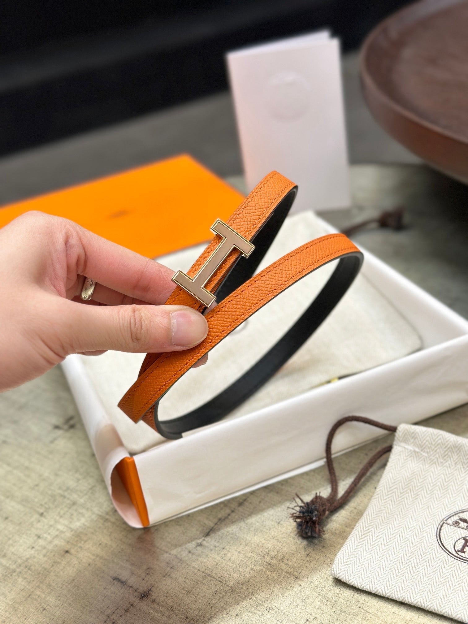 HERMES FOCUS BUCKLE & REVERSIBLE BLACK AND ORANGE LEATHER STRAP 13MM COPPER HARDWARE