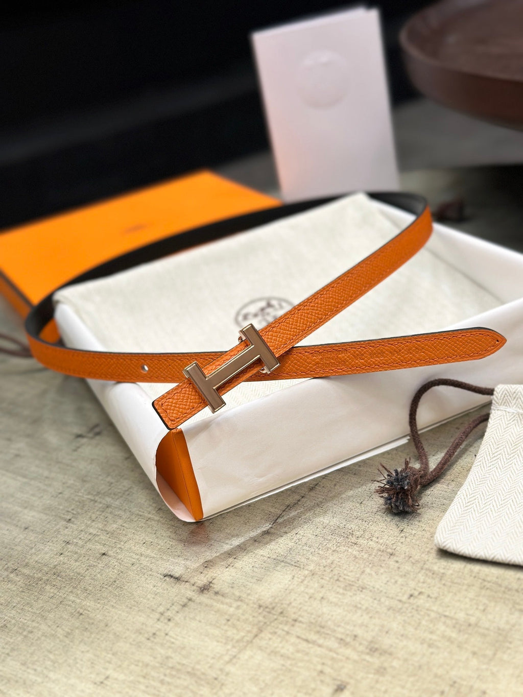 HERMES FOCUS BUCKLE & REVERSIBLE BLACK AND ORANGE LEATHER STRAP 13MM COPPER HARDWARE