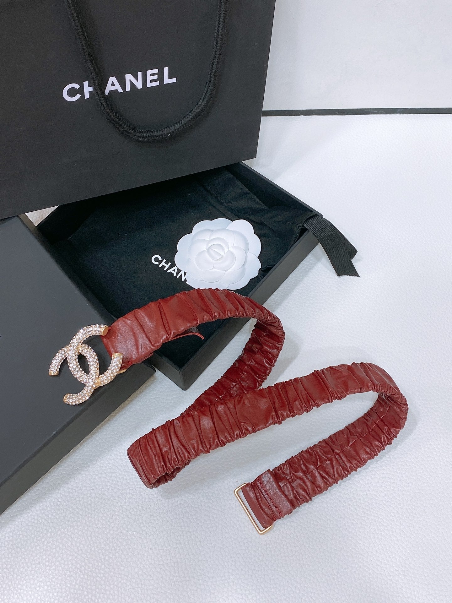 CHANEL ELASTIC BELT 30MM IN WINE RED CALFSKIN GOLD HARDWARE WITH RHINSTONES