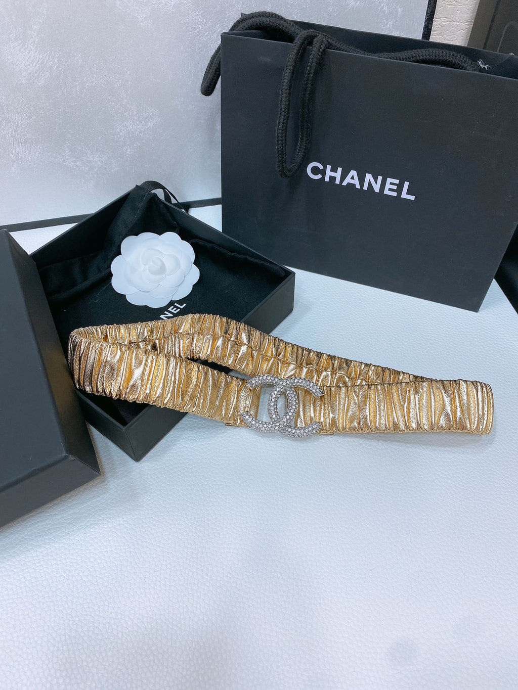 CHANEL ELASTIC BELT 30MM IN GOLD CALFSKIN SILVER HARDWARE WITH RHINSTONES