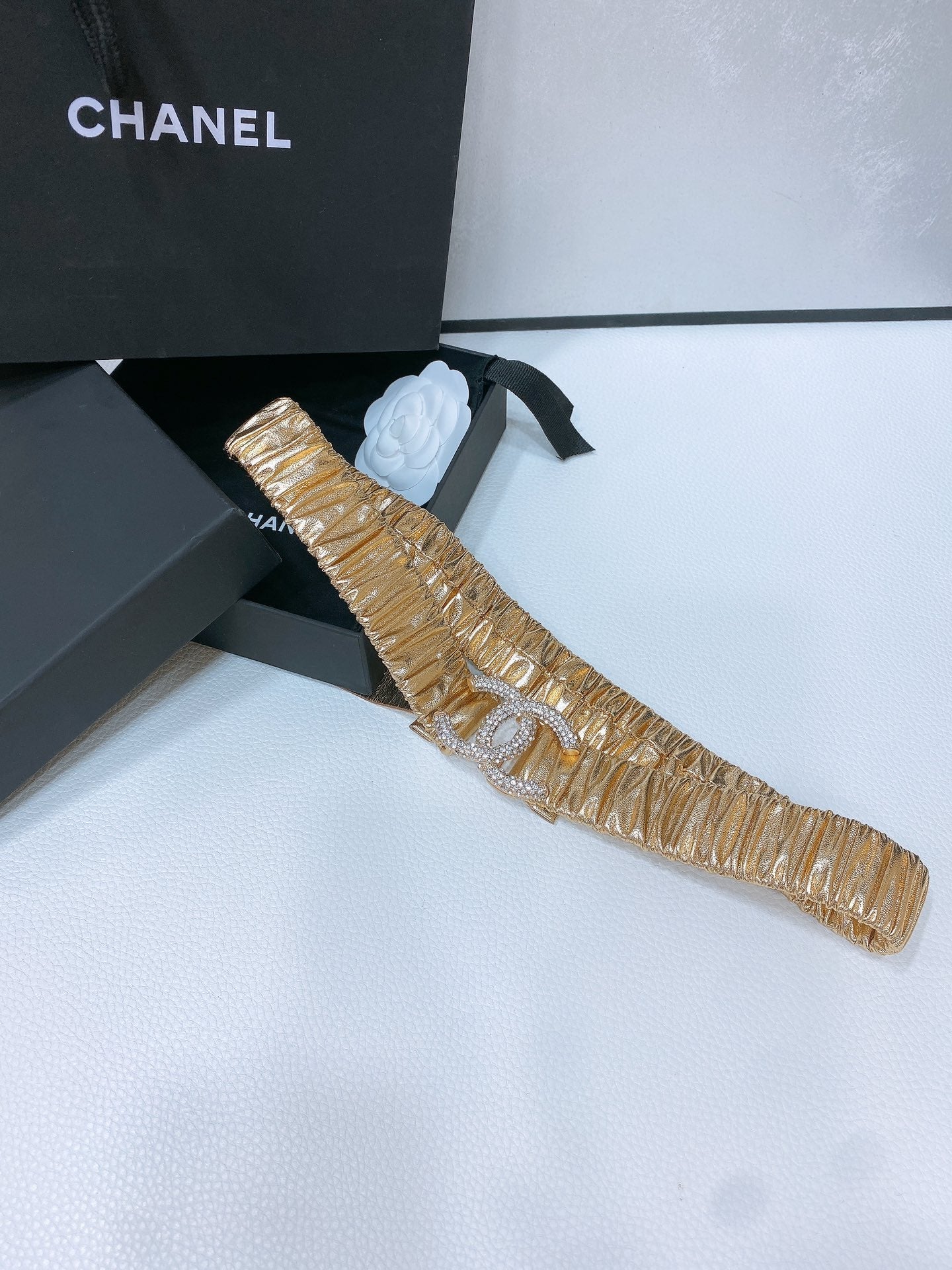 CHANEL ELASTIC BELT 30MM IN GOLD CALFSKIN GOLD HARDWARE WITH RHINSTONES