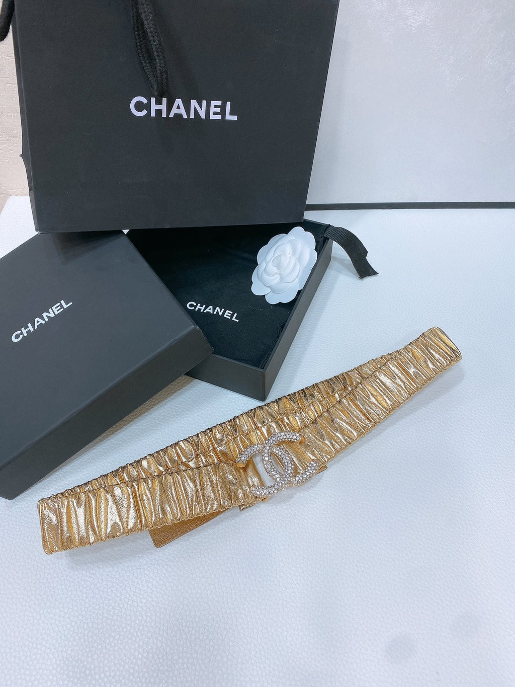 CHANEL ELASTIC BELT 30MM IN GOLD CALFSKIN GOLD HARDWARE WITH RHINSTONES