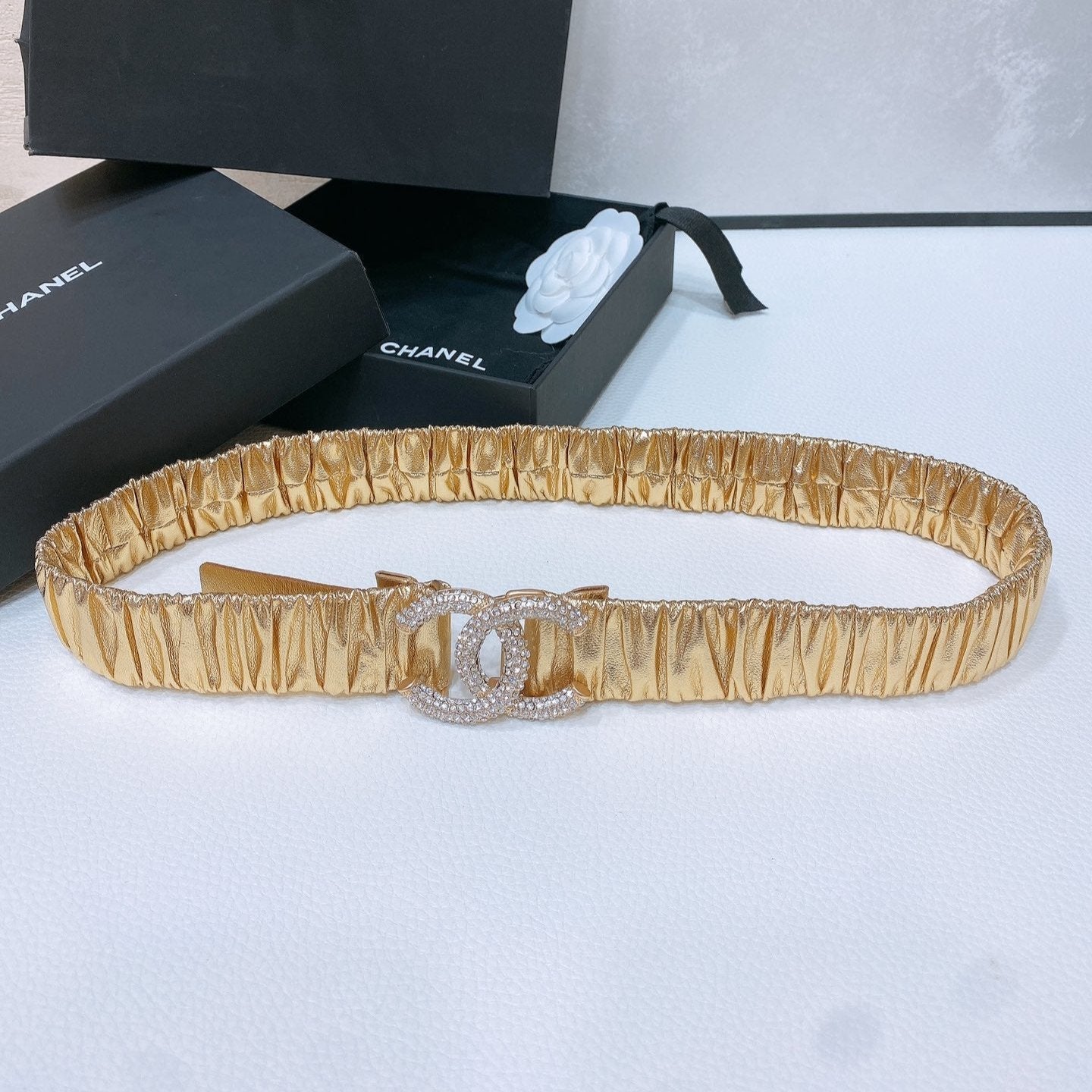 CHANEL ELASTIC BELT 30MM IN GOLD CALFSKIN GOLD HARDWARE WITH RHINSTONES