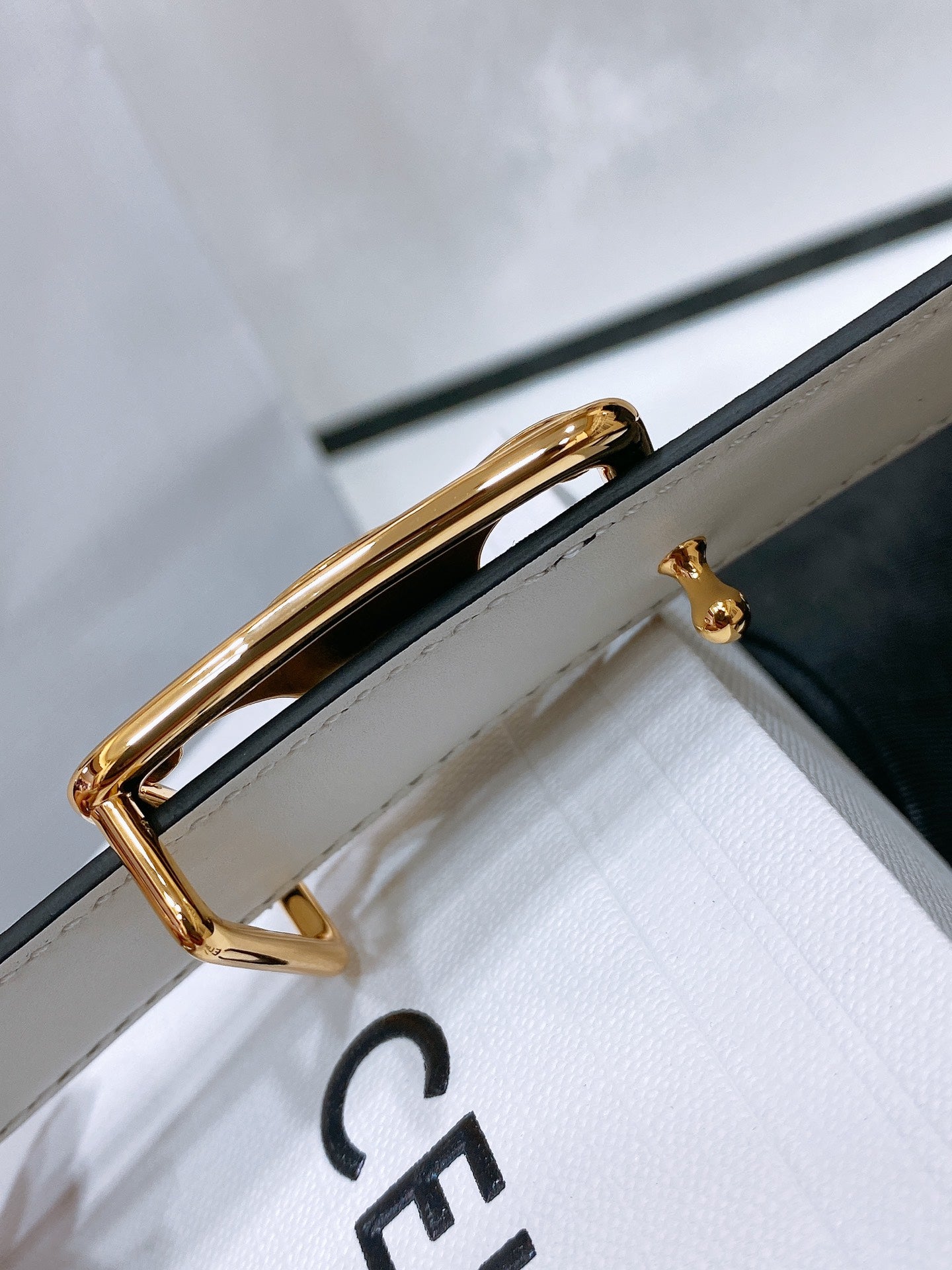 CELINE CL MEDIUM 25 MM TRIOMPHE BELT IN TAURILLON AND BLACK CALFSKIN GOLD HARDWARE
