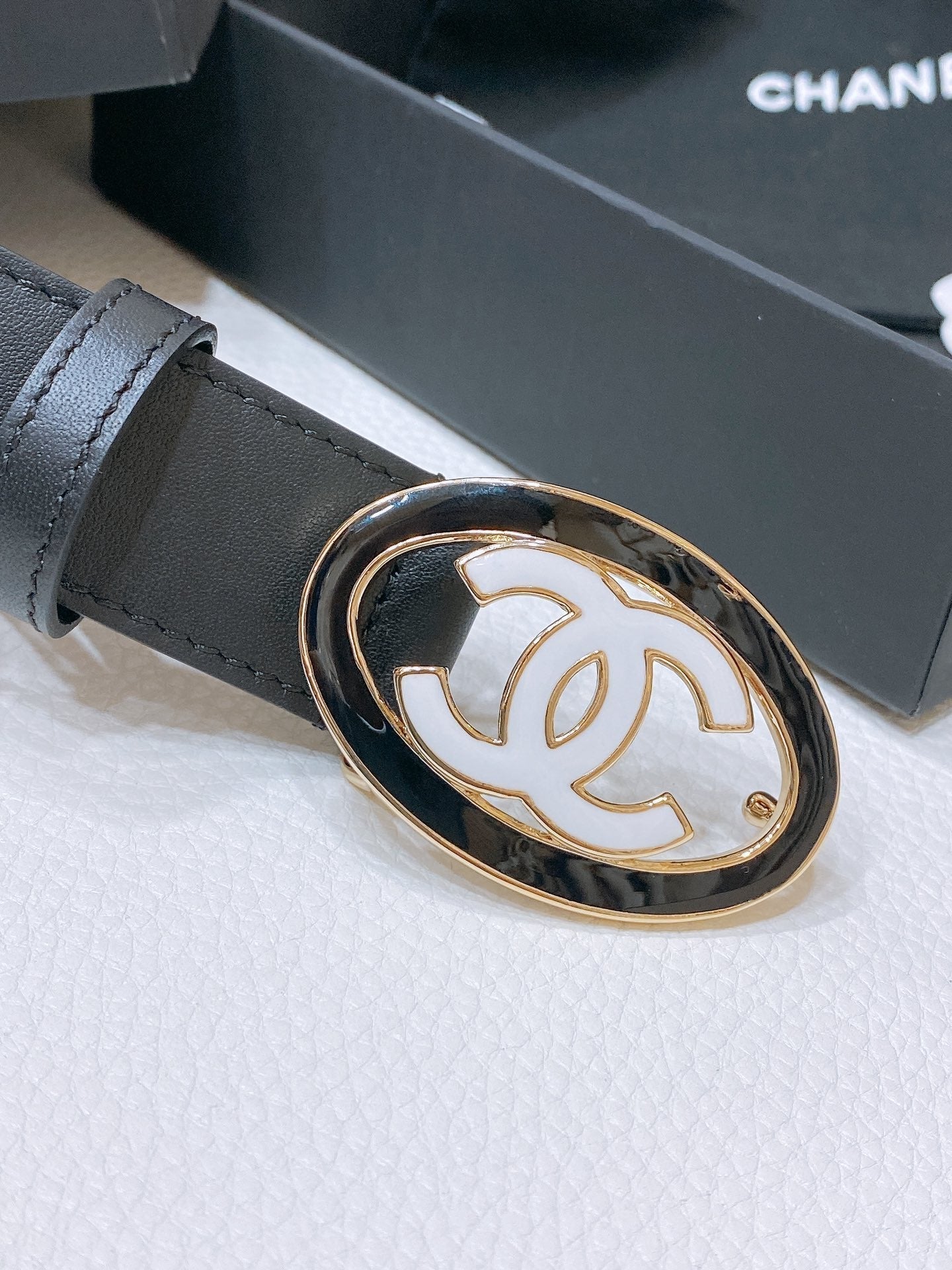 CHANEL 30MM BELT IN BLACK SMOOTH CALFSKIN WHITE MIX BLACK METAL LOGO GOLD HARDWARE
