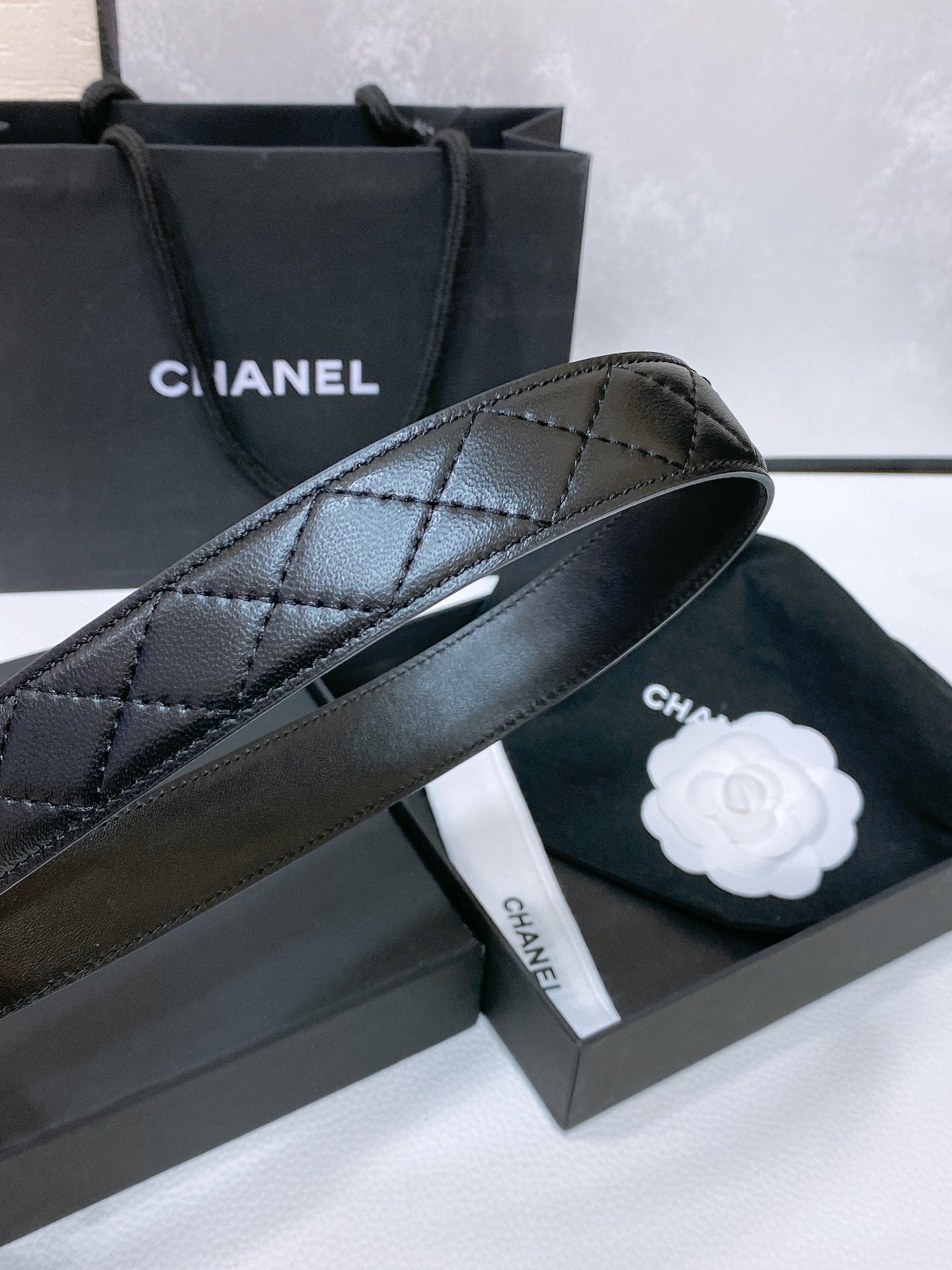 CHANEL BELT 30 MM IN BLACK EMBROIDERED CALFSKIN PEARL LOGO WITH GOLD HARDWARE