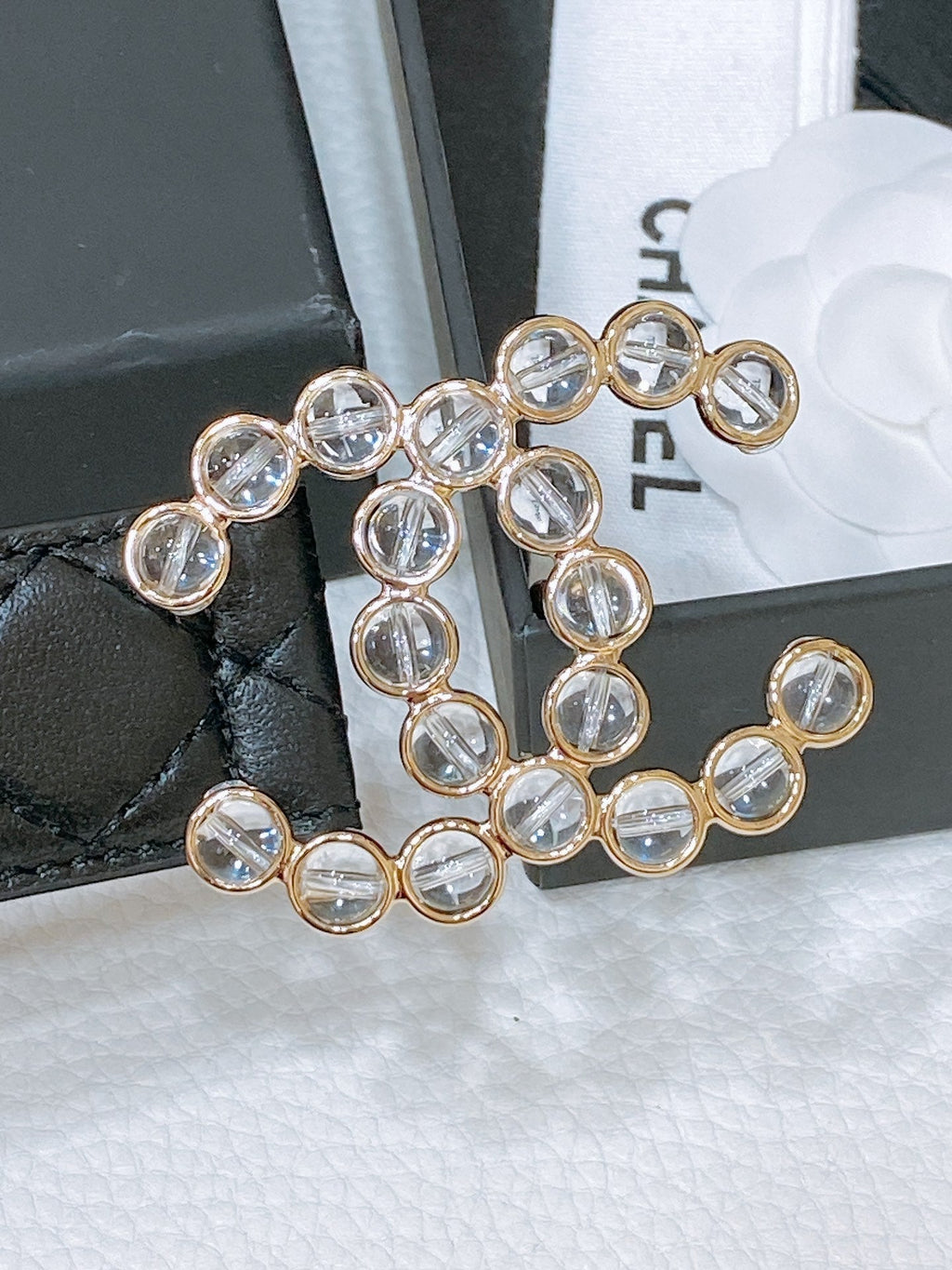 CHANEL BELT 30 MM IN BLACK EMBROIDERED CALFSKIN PEARL LOGO WITH GOLD HARDWARE