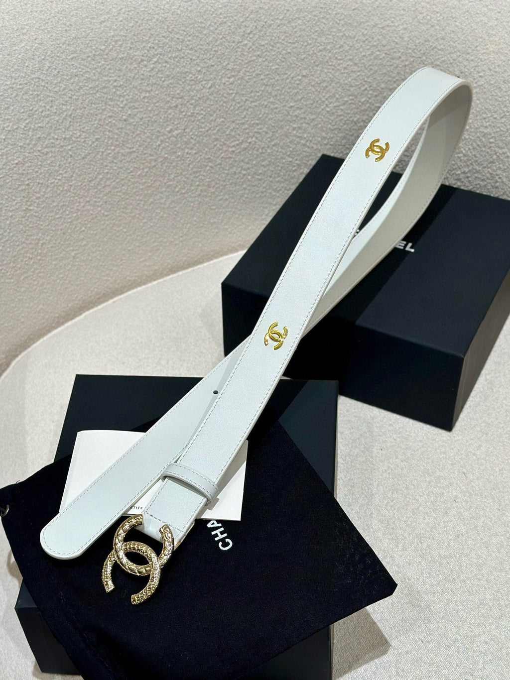 CHANEL DOUBLE C BELT 30MM IN WHITE CALFSKIN GOLD BUCKLE WITH EMBOSSED CHECK PATTERN