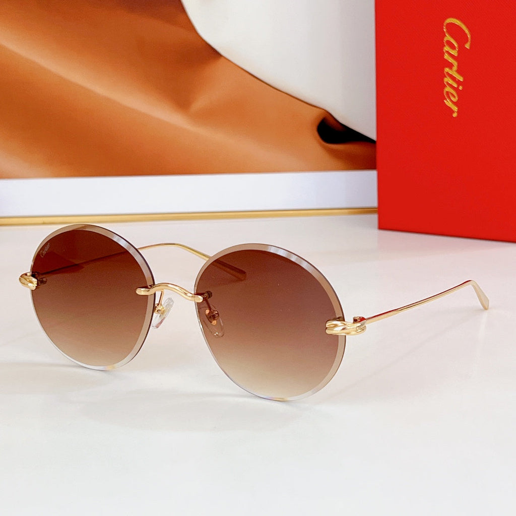 CARTIER PREMIÈRE RIMLESS ROUND FRAME SUNGLASSES CT0475 IN METAL