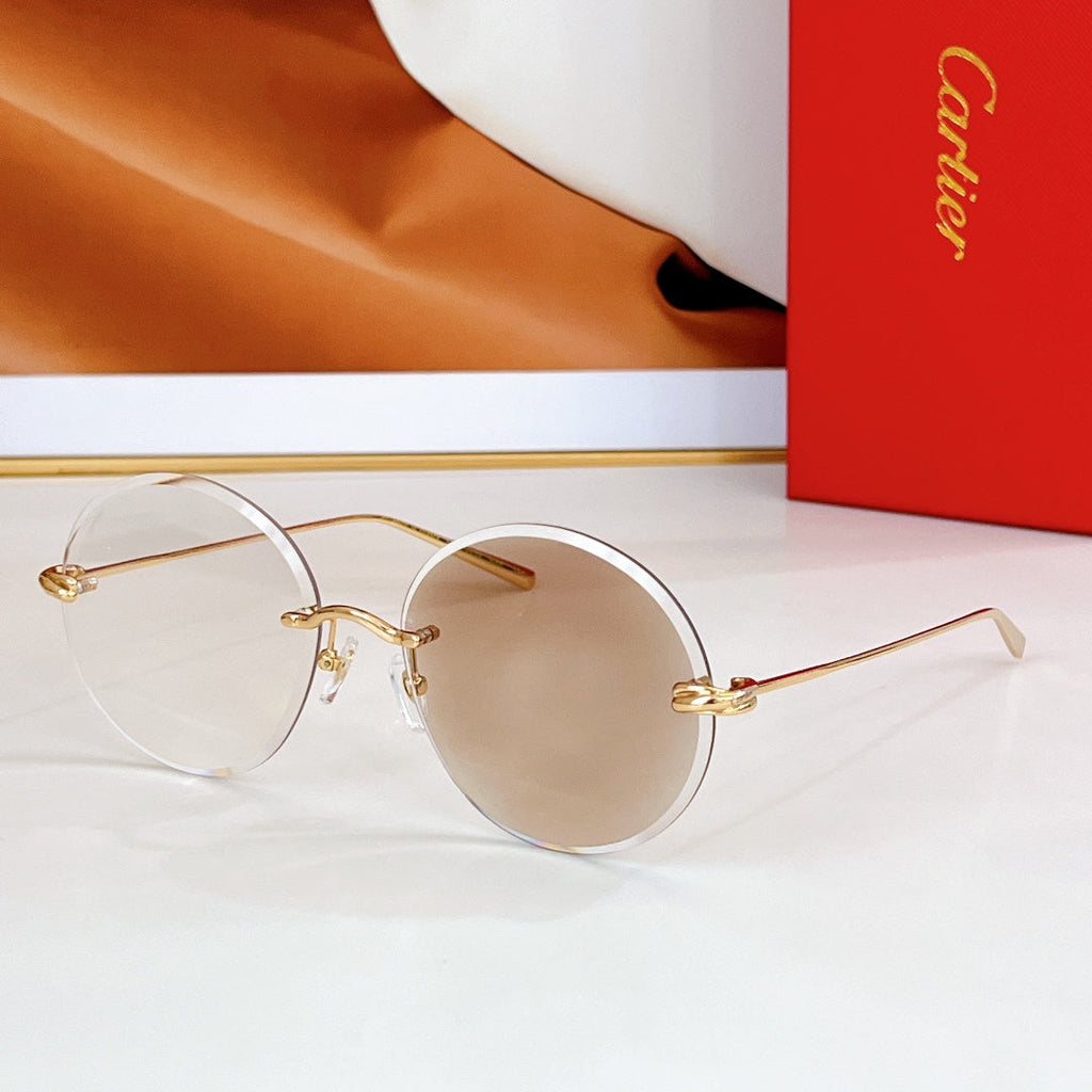 CARTIER PREMIÈRE RIMLESS ROUND FRAME SUNGLASSES CT0475 IN METAL
