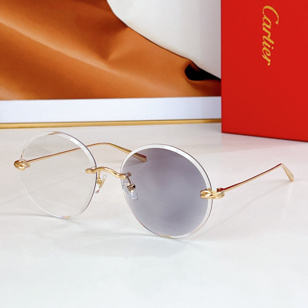 CARTIER PREMIÈRE RIMLESS ROUND FRAME SUNGLASSES CT0475 IN METAL