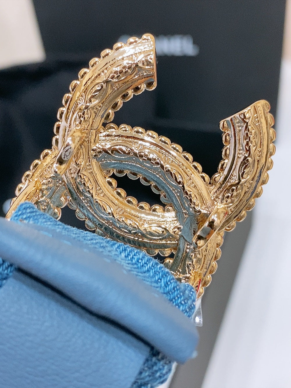 CHANEL DOUBLE C ELASTIC BELT 30MM IN BLUE DENIM WITH GOLD BUCKLE AND SIDE RHINESTONE DETAILING