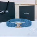 CHANEL DOUBLE C ELASTIC BELT 30MM IN BLUE DENIM WITH GOLD BUCKLE AND SIDE RHINESTONE DETAILING