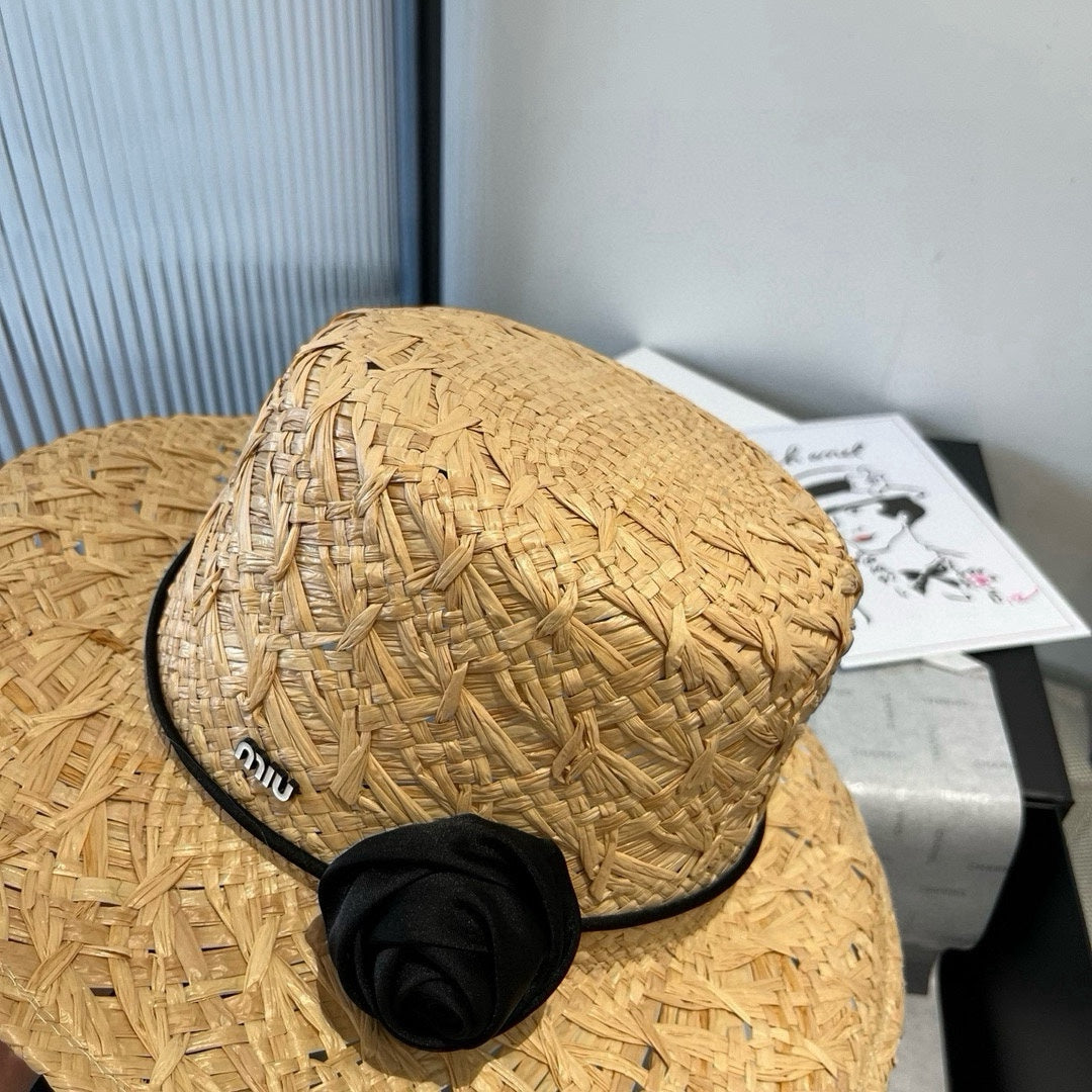 MIU MIU MM STRAW HAT IN BEIGE RAFFIA WITH BLACK FLOWER ACCENT