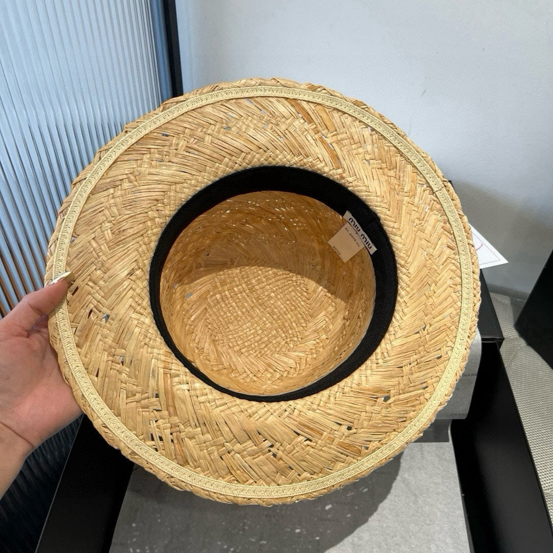 MIU MIU MM STRAW HAT IN BEIGE RAFFIA WITH BLACK FLOWER ACCENT