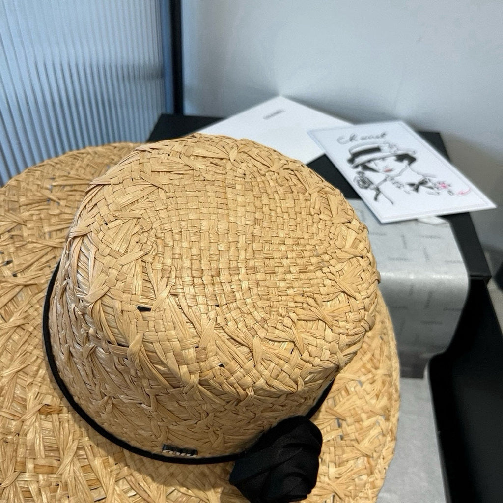 MIU MIU MM STRAW HAT IN BEIGE RAFFIA WITH BLACK FLOWER ACCENT
