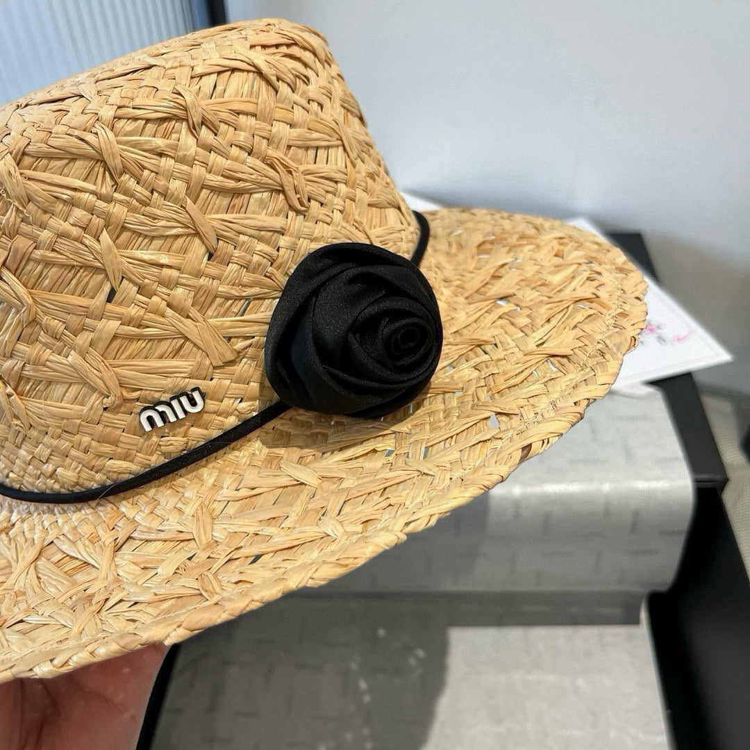 MIU MIU MM STRAW HAT IN BEIGE RAFFIA WITH BLACK FLOWER ACCENT
