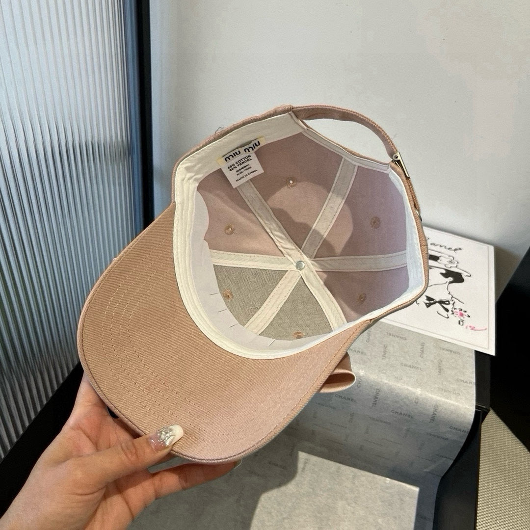MIU MIU MM BASEBALL CAP IN BEIGE FABRIC WITH LARGE PINK BOW