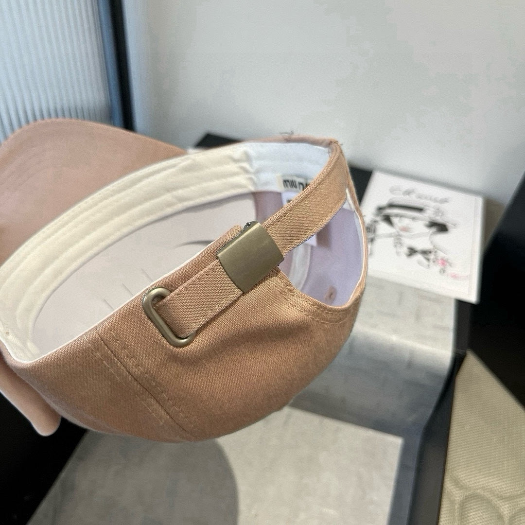 MIU MIU MM BASEBALL CAP IN BEIGE FABRIC WITH LARGE PINK BOW
