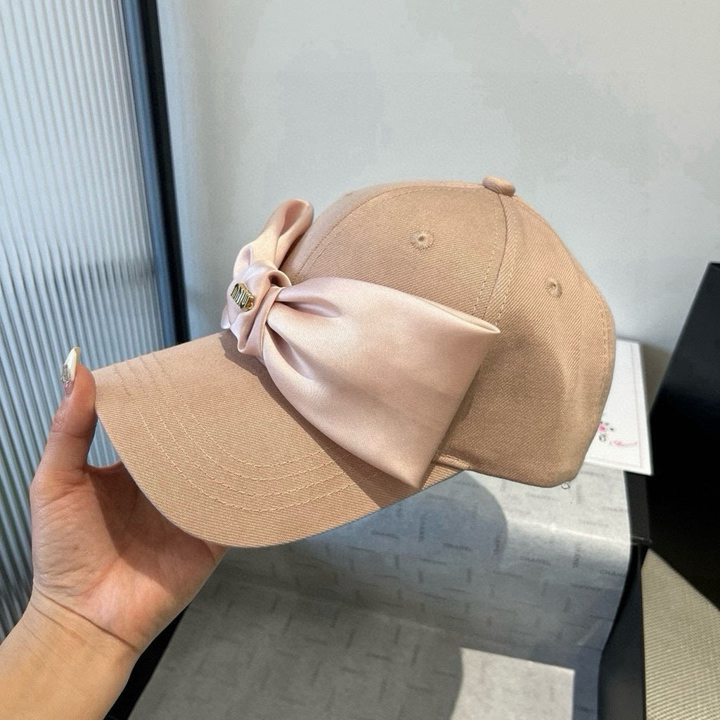 MIU MIU MM BASEBALL CAP IN BEIGE FABRIC WITH LARGE PINK BOW