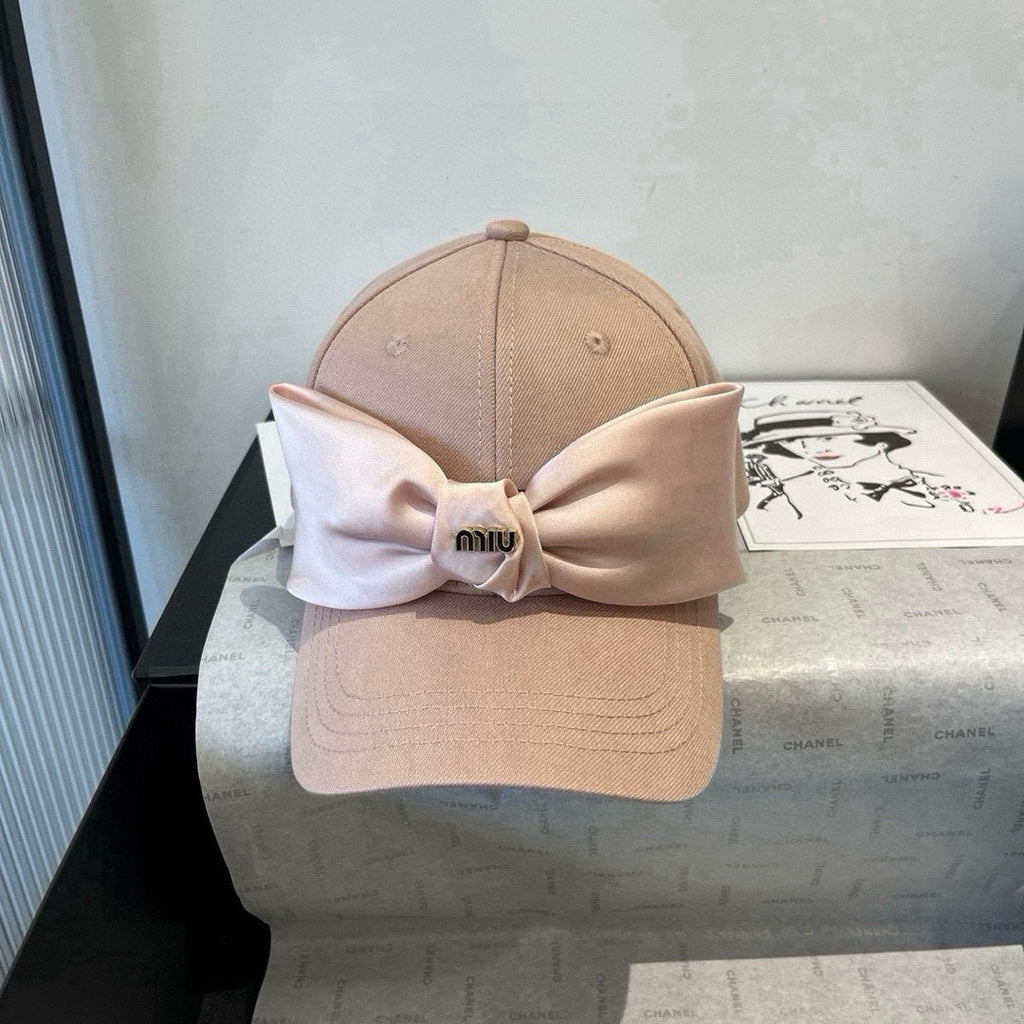 MIU MIU MM BASEBALL CAP IN BEIGE FABRIC WITH LARGE PINK BOW