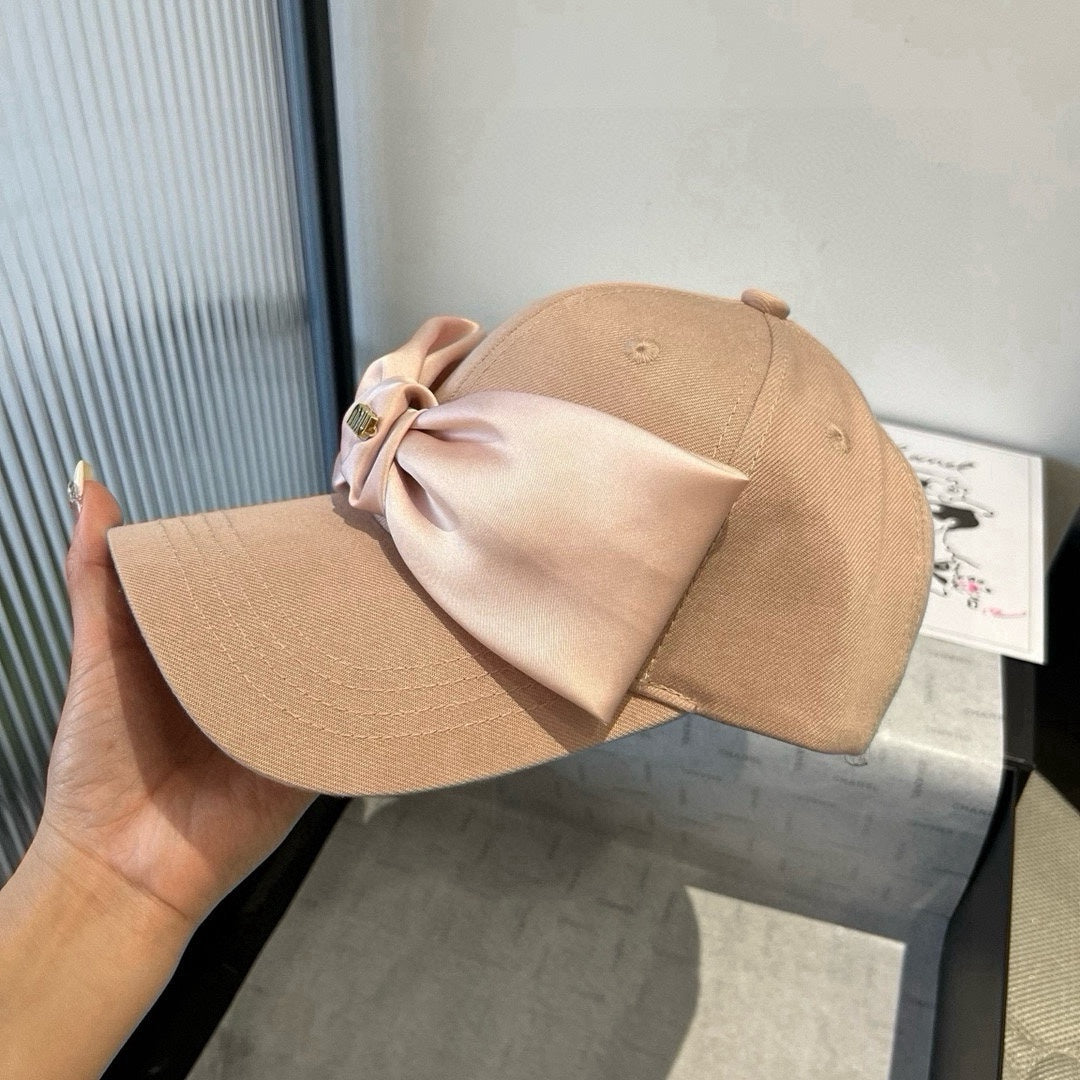 MIU MIU MM BASEBALL CAP IN BEIGE FABRIC WITH LARGE PINK BOW