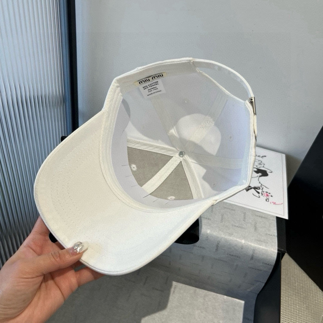 MIU MIU MM BASEBALL CAP IN WHITE FABRIC WITH LARGE BLACK BOW