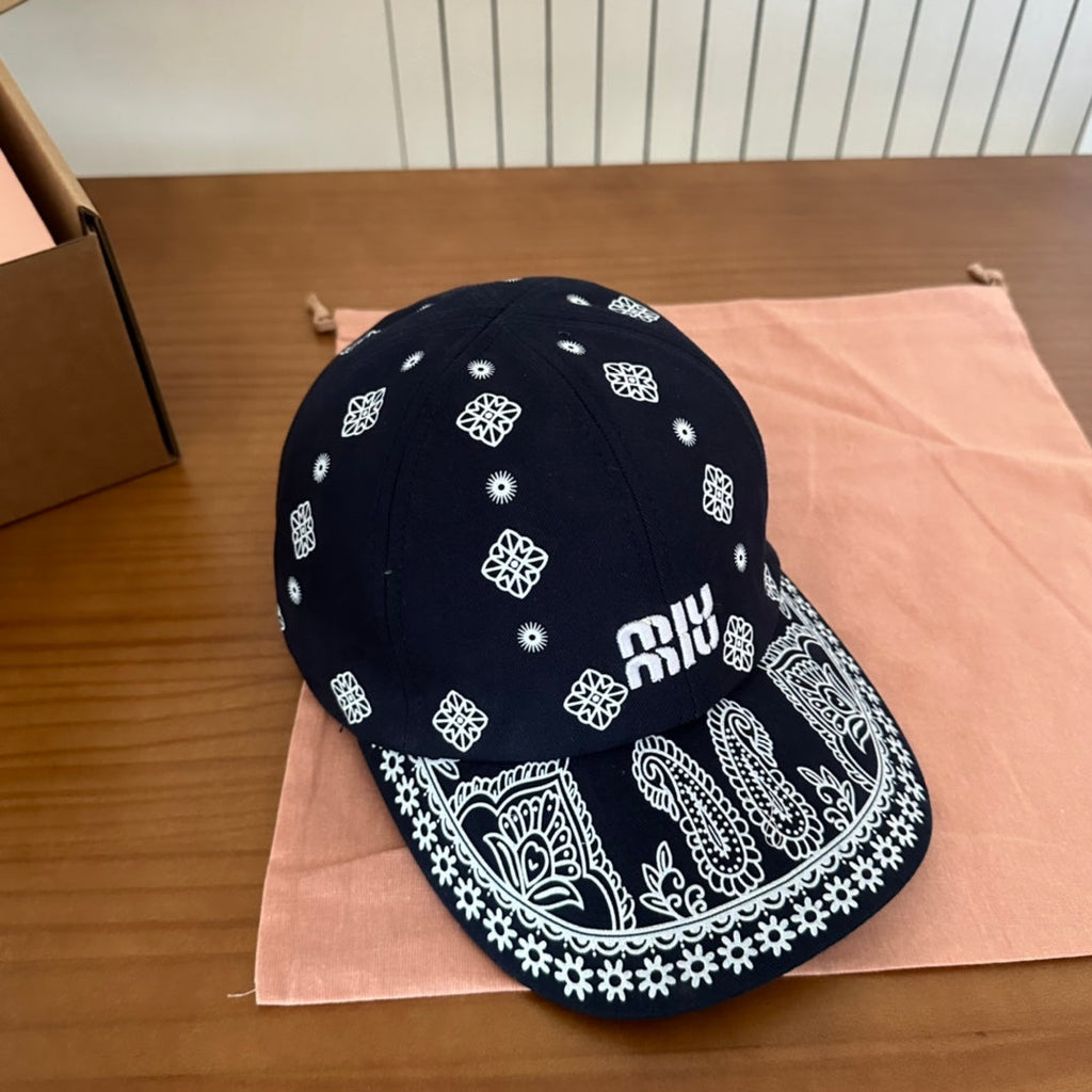 MIU MIU MM BASEBALL CAP IN BLACK WITH WHITE EMBROIDERED PATTERN