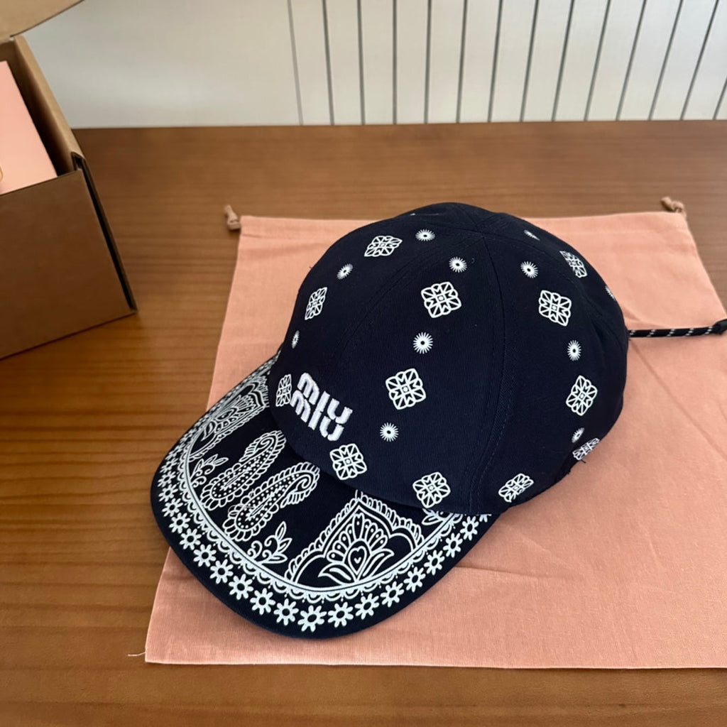 MIU MIU MM BASEBALL CAP IN BLACK WITH WHITE EMBROIDERED PATTERN