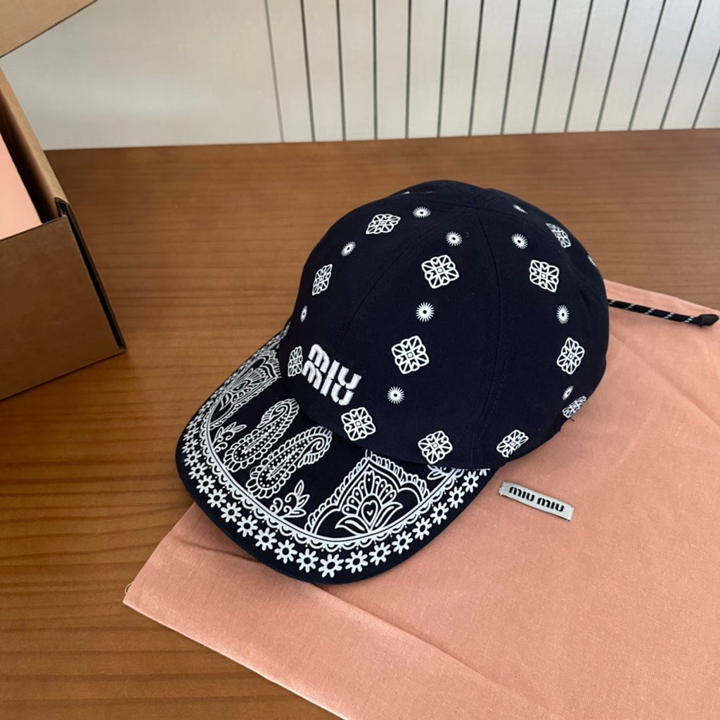 MIU MIU MM BASEBALL CAP IN BLACK WITH WHITE EMBROIDERED PATTERN