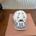 MIU MIU MM BASEBALL CAP IN WHITE WITH BLACK EMBROIDERED PATTERN