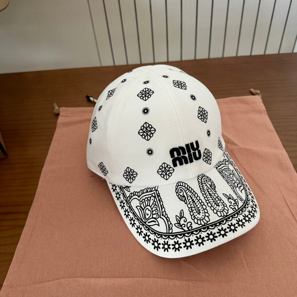 MIU MIU MM BASEBALL CAP IN WHITE WITH BLACK EMBROIDERED PATTERN