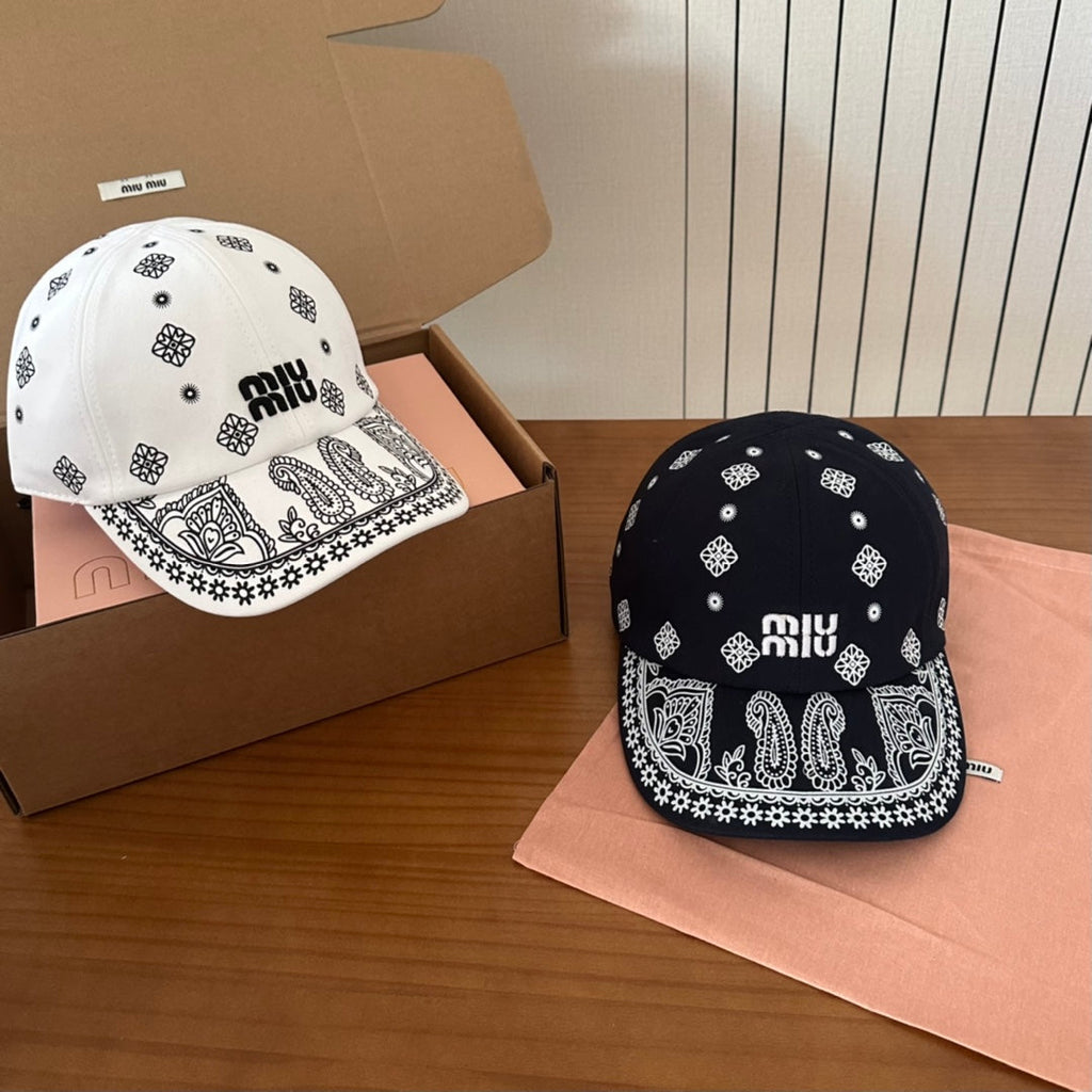 MIU MIU MM BASEBALL CAP IN WHITE WITH BLACK EMBROIDERED PATTERN