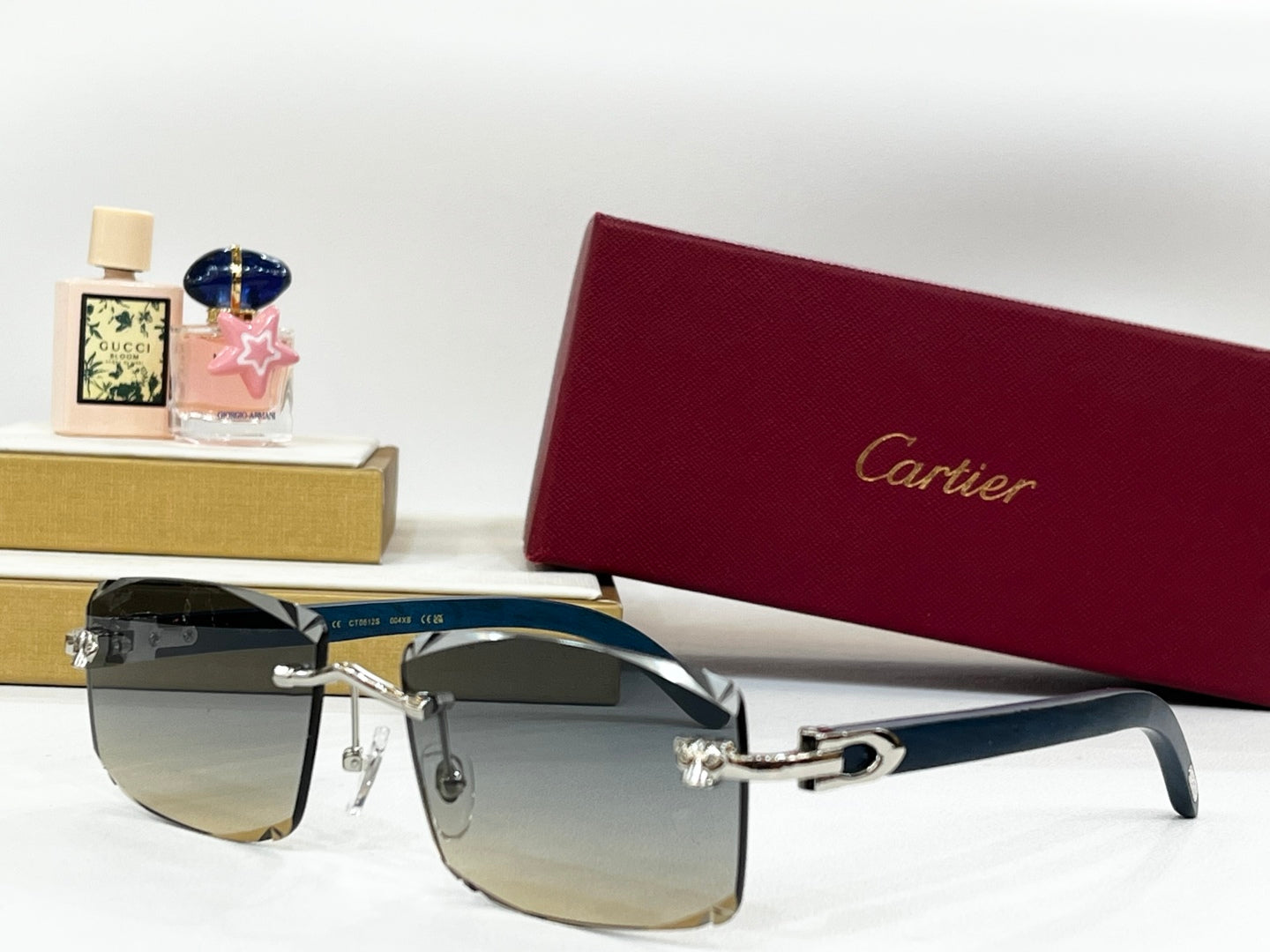 CARTIER RIMLESS RECTANGULAR FRAME SUNGLASSES CT0612S IN METAL