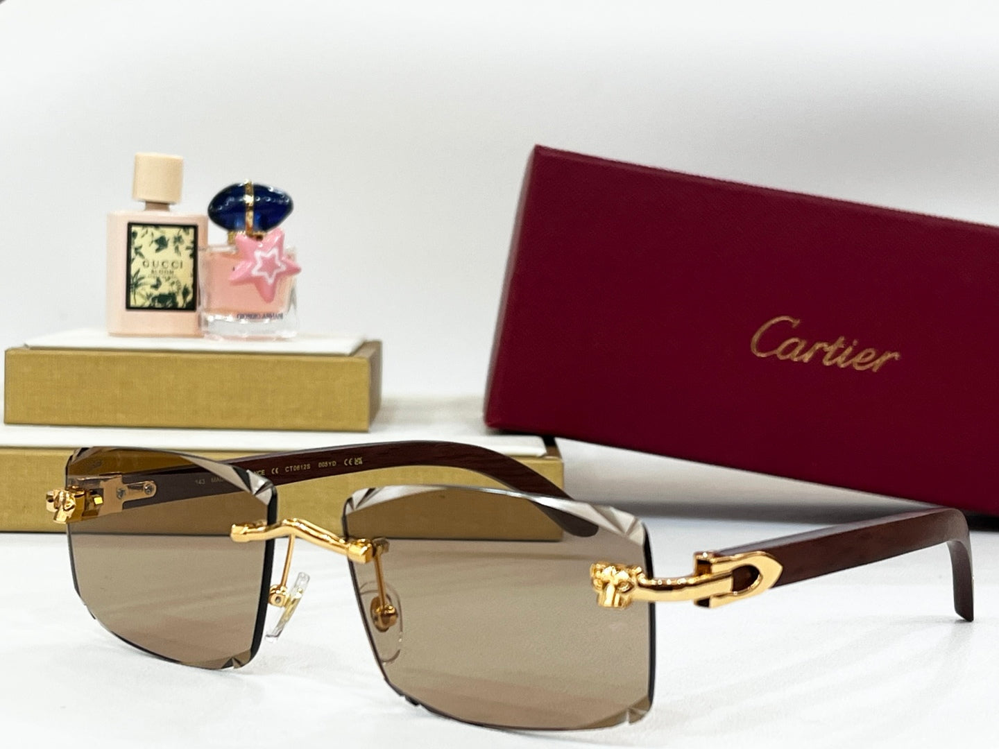CARTIER RIMLESS RECTANGULAR FRAME SUNGLASSES CT0612S IN METAL