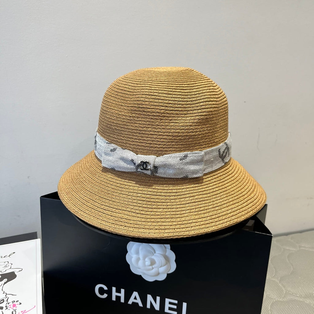 CHANEL STRAW BUCKET HAT IN BROWN WITH RIBBON BOW 673978