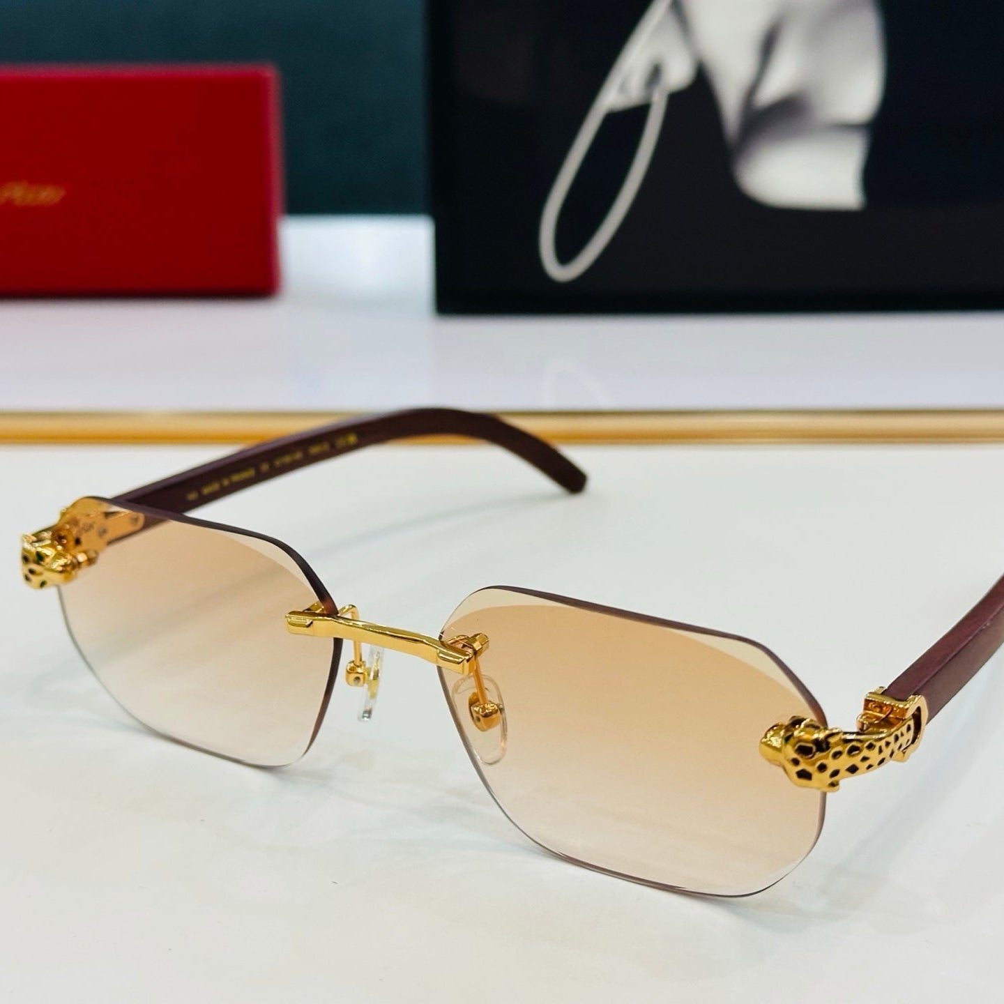 CARTIER PANTHÈRE RIMLESS OVAL FRAME SUNGLASSES 543637 IN METAL