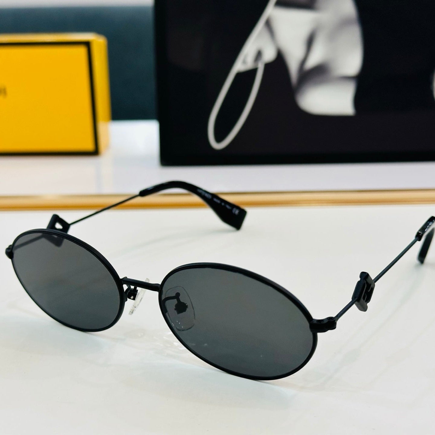 FENDI FIRST CRYSTAL OVAL FRAME SUNGLASSES E40151 IN METAL