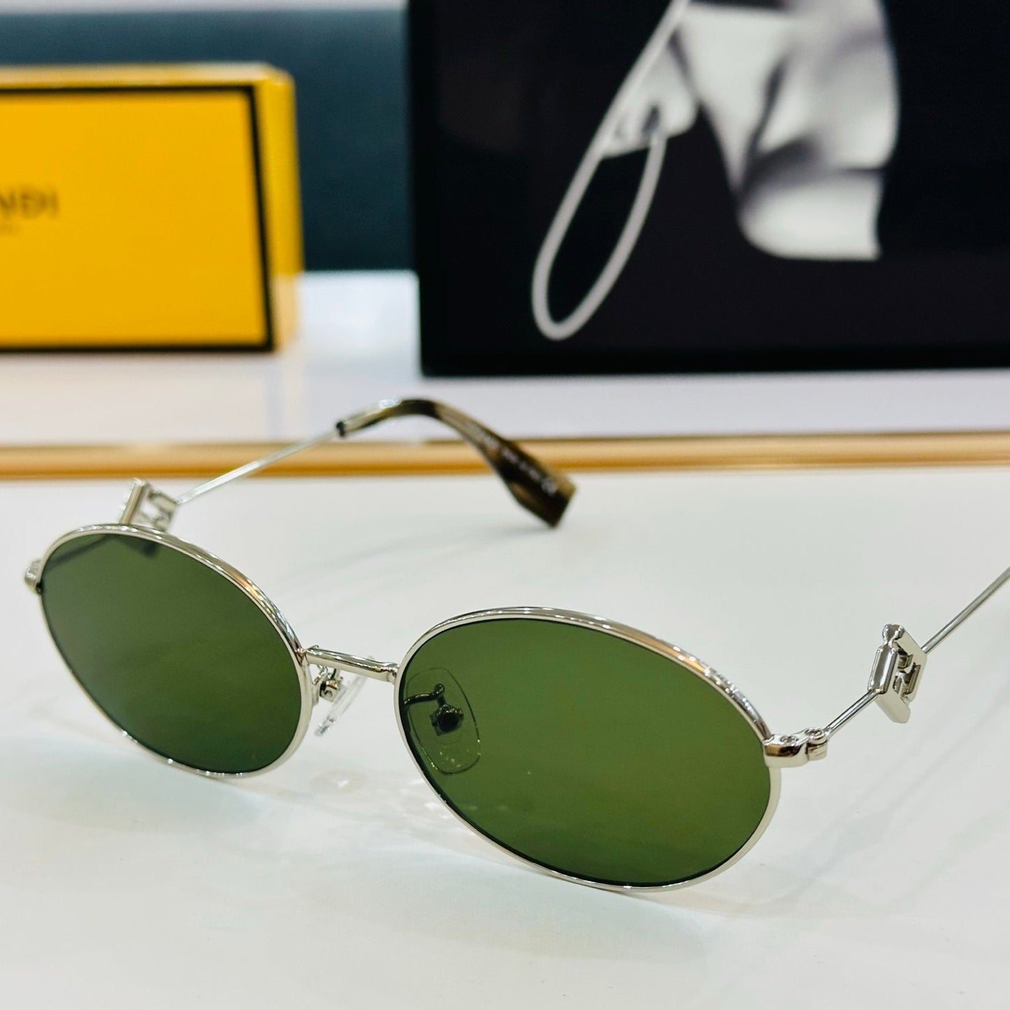 FENDI FIRST CRYSTAL OVAL FRAME SUNGLASSES E40151 IN METAL