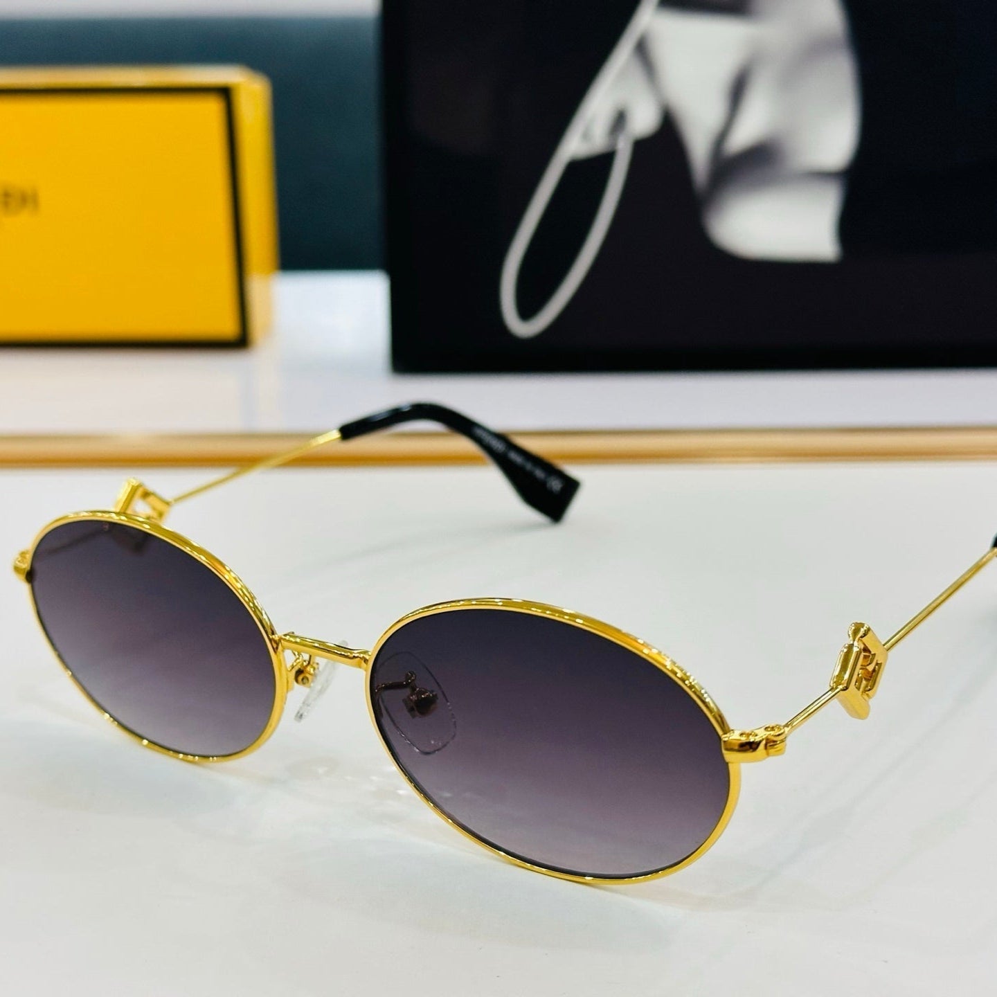FENDI FIRST CRYSTAL OVAL FRAME SUNGLASSES E40151 IN METAL