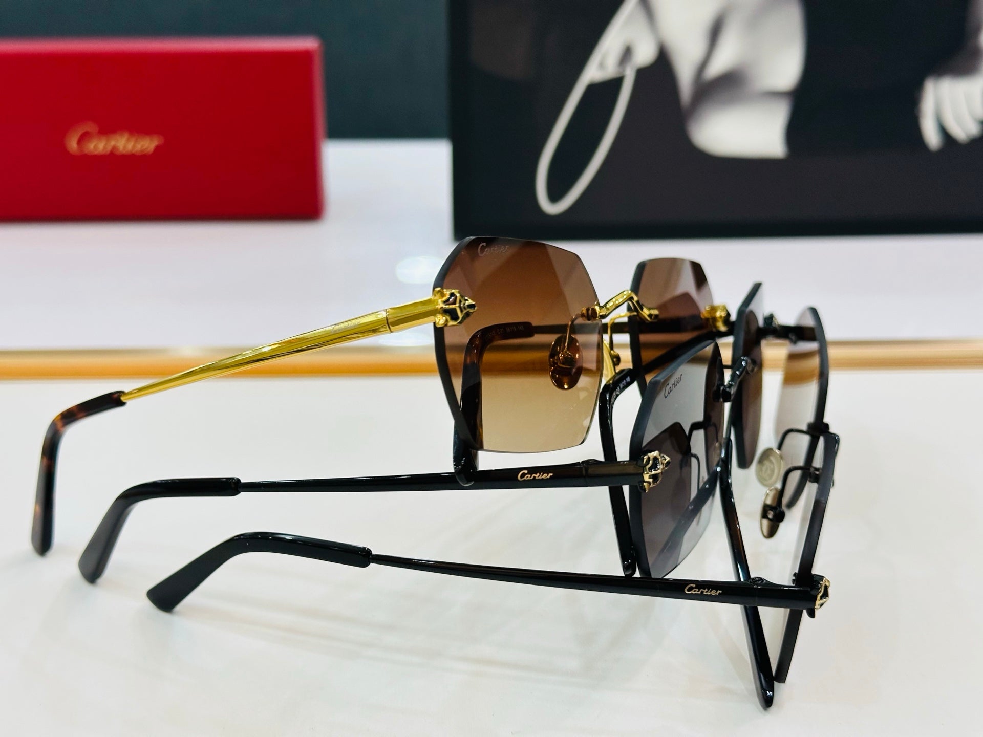 CARTIER PANTHÈRE RIMLESS GEOMETRIC FRAME SUNGLASSES CT0504S IN METAL