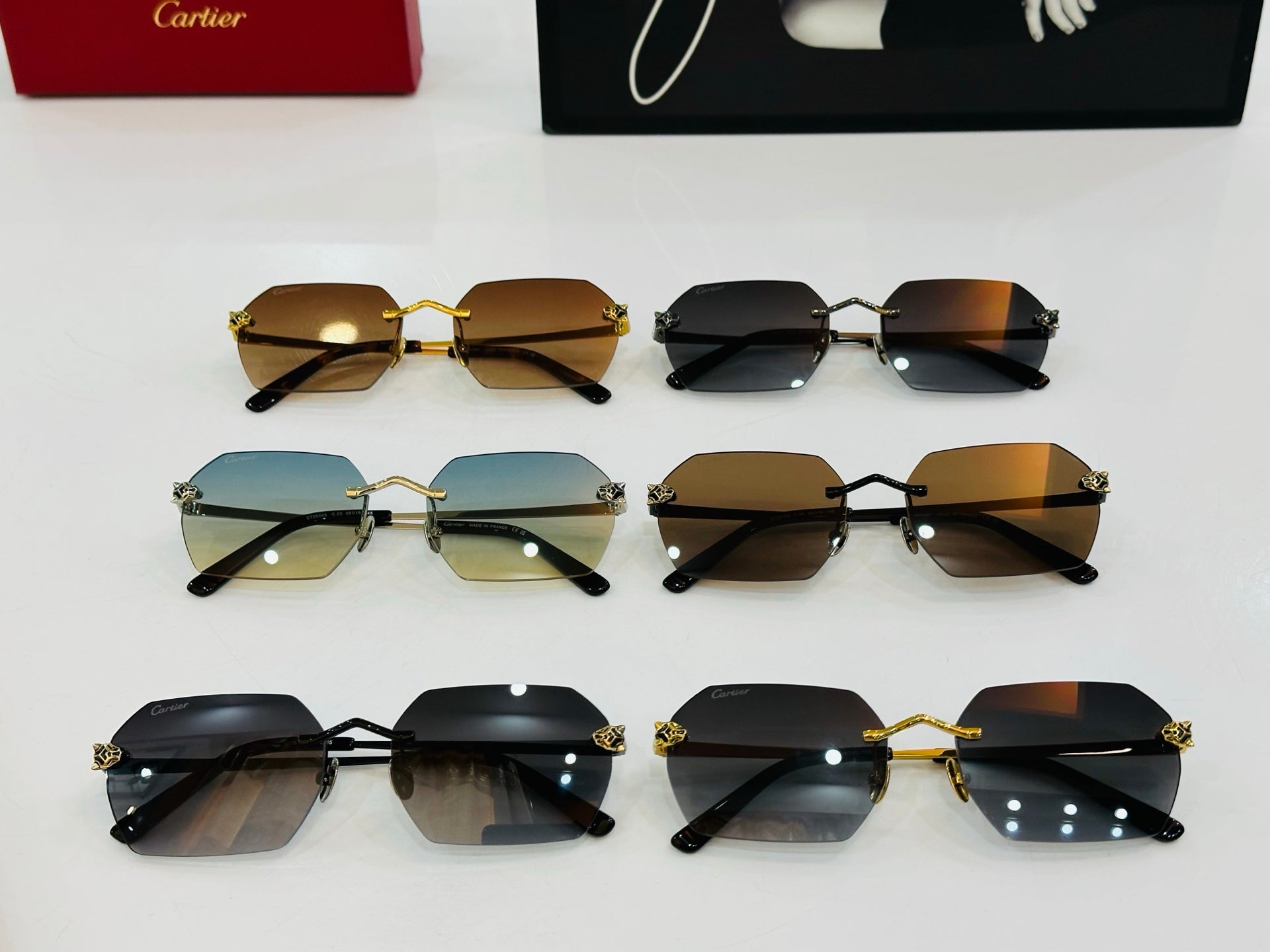 CARTIER PANTHÈRE RIMLESS GEOMETRIC FRAME SUNGLASSES CT0504S IN METAL