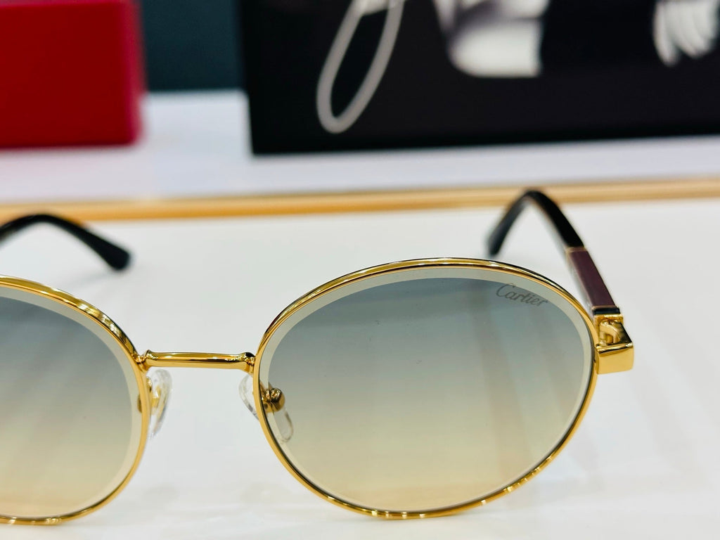 CARTIER PREMIÈRE ROUND FRAME SUNGLASSES CT0490S IN METAL